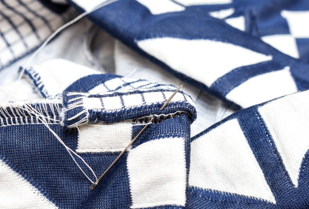 A simple way to add pockets to cardigan. Can be done using a sewing machine