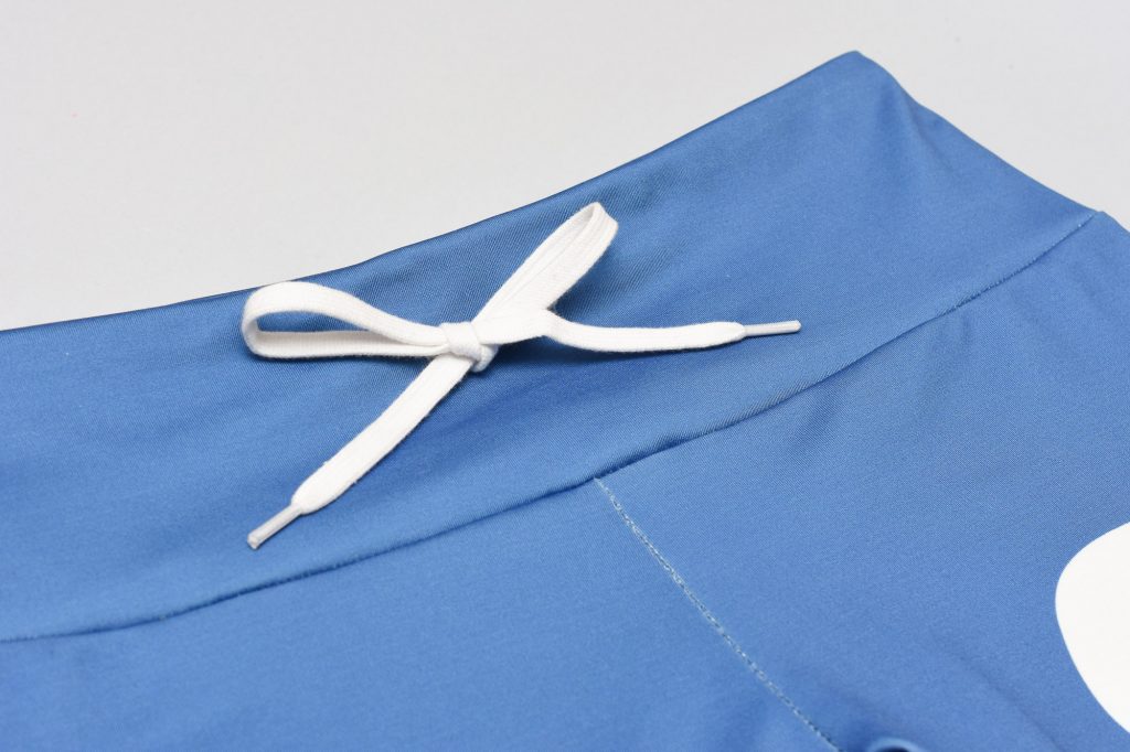 step-by-step sewing tutorial on how to add drawstrings to a leggings waistband